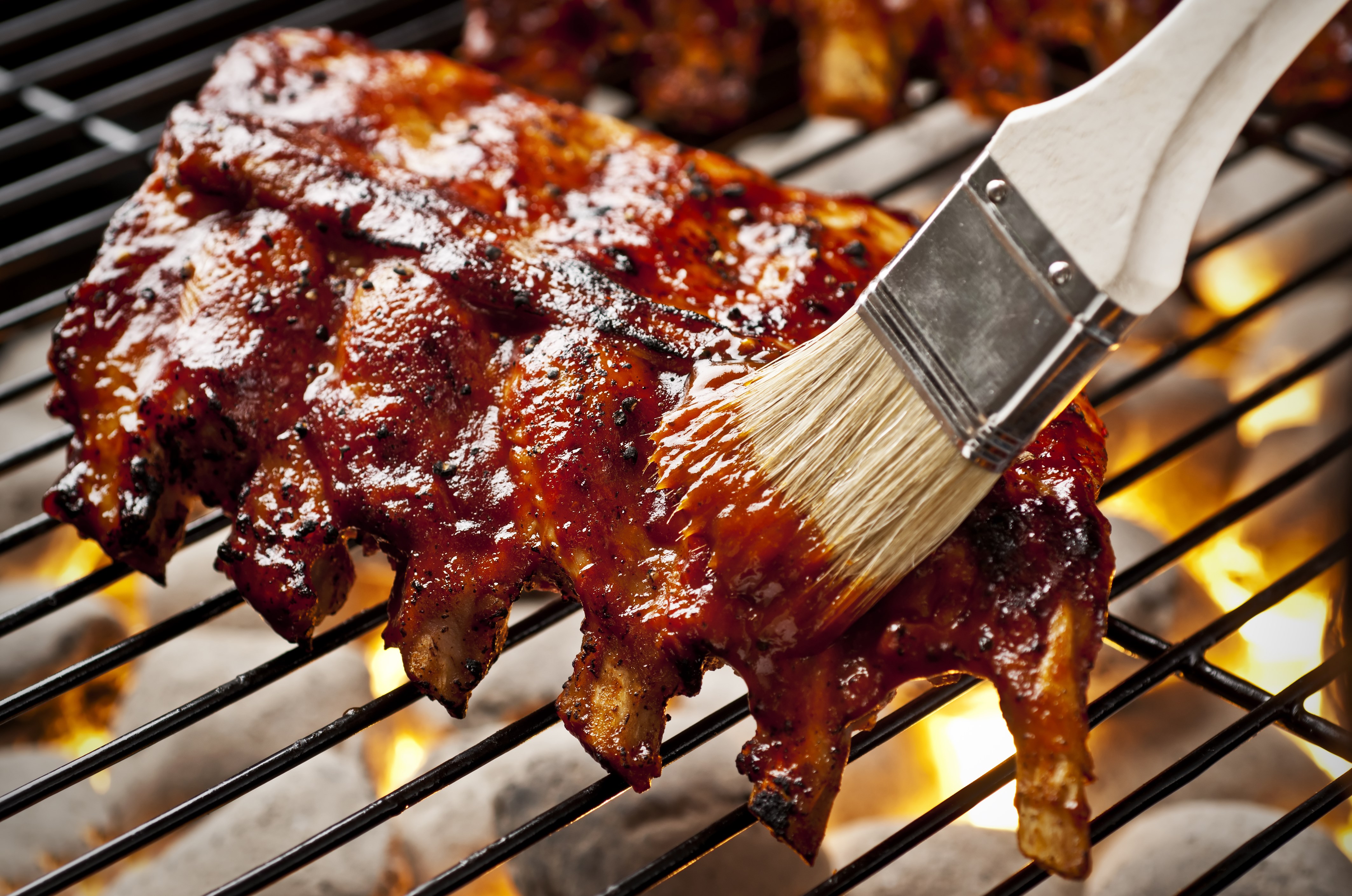 Fire Up the Grill! BISSELL Rental's best grilling and cleaning tips will make throwing your summer party as easy as can be.